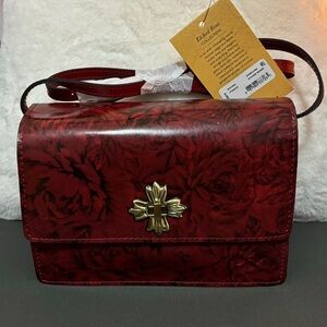 Patricia Nash Consilina Etched Rose women’s crossbody organizer.